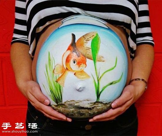 準(zhǔn)媽媽隆起肚皮上的漂亮彩繪 -  rpnrmr.com