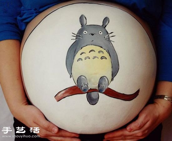 準(zhǔn)媽媽隆起肚皮上的漂亮彩繪 -  rpnrmr.com