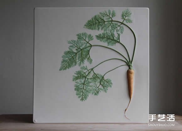 將花草和蔬菜放入陶土 制作出植物化石瓷磚 -  rpnrmr.com
