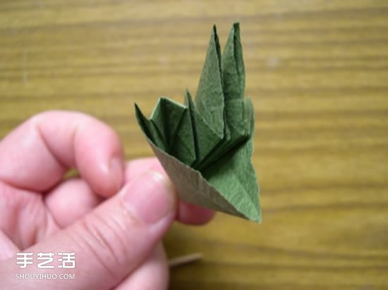 折紙娃娃的制作方法 穿裙子娃娃的折法圖解 -  rpnrmr.com
