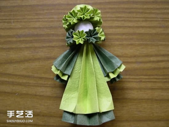 折紙娃娃的制作方法 穿裙子娃娃的折法圖解 -  rpnrmr.com