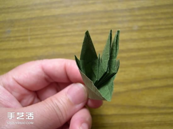 折紙娃娃的制作方法 穿裙子娃娃的折法圖解 -  rpnrmr.com