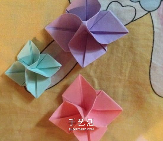 四瓣花折紙圖解教程 手工折疊四瓣花的方法 -  rpnrmr.com