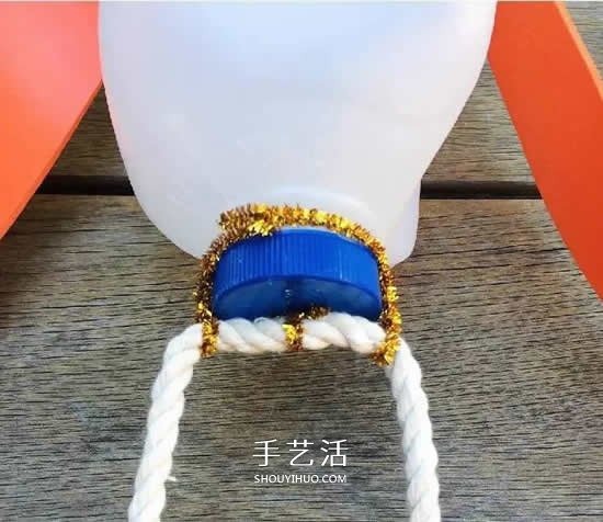 瓶蓋機器人的制作方法 廢物利用做機器人圖解 -  rpnrmr.com