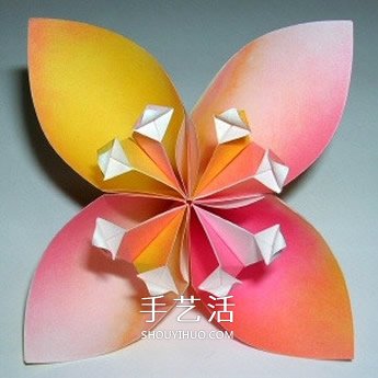 四瓣花的折紙方法圖解 六個(gè)組合成美麗花球 -  rpnrmr.com