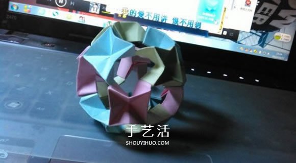 鏤空紙花球怎么折圖解 簡(jiǎn)單手工花球的折法 -  rpnrmr.com