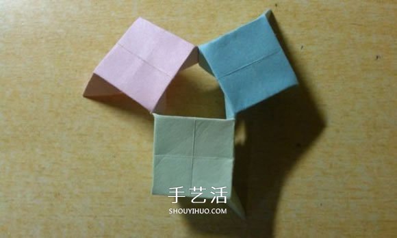 鏤空紙花球怎么折圖解 簡(jiǎn)單手工花球的折法 -  rpnrmr.com
