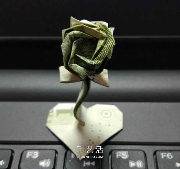 紙幣折心花怒放的方法 情人節(jié)愛心玫瑰花折法 -  rpnrmr.com