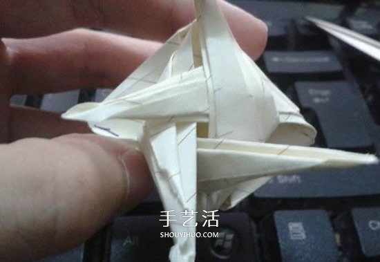 珠光海螺怎么折的教程 手工折紙海螺的步驟圖 -  rpnrmr.com