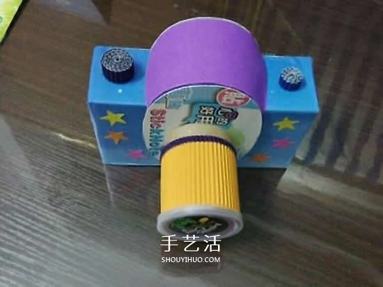 幼兒園手工作品圖片 廢物利用做的漂亮相機(jī) -  rpnrmr.com