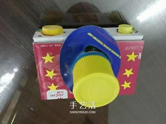 幼兒園手工作品圖片 廢物利用做的漂亮相機(jī) -  rpnrmr.com