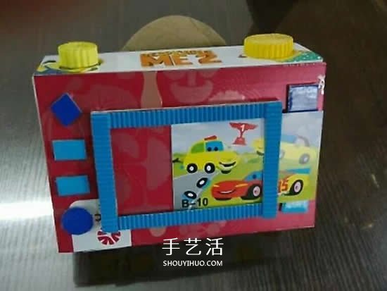 幼兒園手工作品圖片 廢物利用做的漂亮相機(jī) -  rpnrmr.com