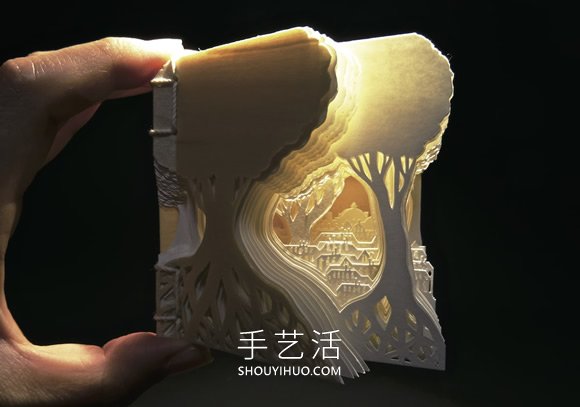 由數(shù)十張紙制作而成的立體城市和森林紙雕 -  rpnrmr.com