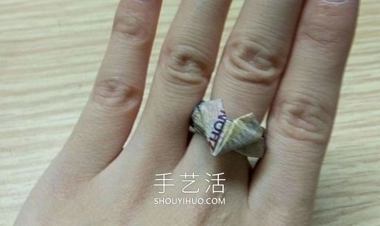 如何用紙幣折戒指愛(ài)心的方法步驟圖解教程 -  rpnrmr.com