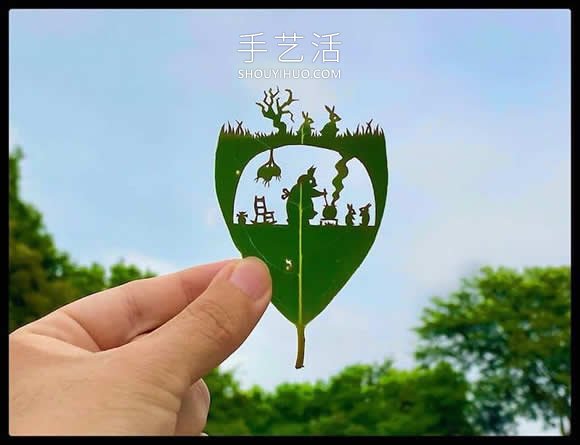 藝術(shù)家精心將復(fù)雜的場景雕刻在樹葉上 -  rpnrmr.com