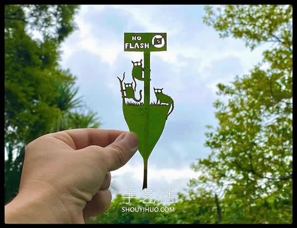 藝術(shù)家精心將復(fù)雜的場景雕刻在樹葉上 -  rpnrmr.com