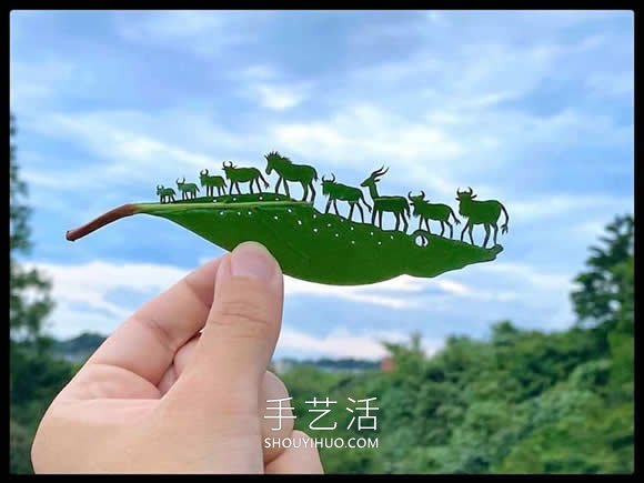 藝術(shù)家精心將復(fù)雜的場景雕刻在樹葉上 -  rpnrmr.com