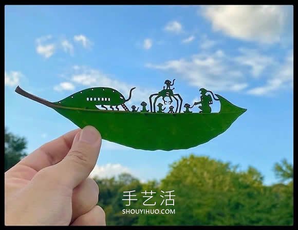 藝術(shù)家精心將復(fù)雜的場景雕刻在樹葉上 -  rpnrmr.com