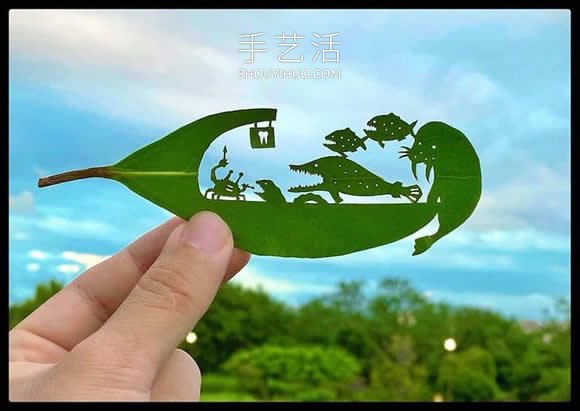 藝術(shù)家精心將復(fù)雜的場景雕刻在樹葉上 -  rpnrmr.com